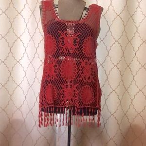 Sleevless open weave top